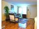Cozy living room with hardwood floors, neutral tones, and a well-lit space at 8431 Sw 93Rd Pl # F, Ocala, FL 34481