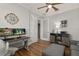 Comfortable home office with functional desk and seating at 8492 Hartford Way, Mount Dora, FL 32757