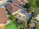 Bird's eye view of the home showcasing the backyard, patio, and mature landscaping at 919 Medira Dr, The Villages, FL 32159