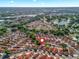 Aerial view of the neighborhood, highlighting nearby shopping centers like Publix, Home Depot, Target, and Best Buy at 919 Medira Dr, The Villages, FL 32159