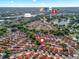 Aerial view of the neighborhood, highlighting nearby shopping centers like Publix, Home Depot, Target, and Best Buy at 919 Medira Dr, The Villages, FL 32159