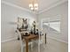 Dining room featuring a modern light fixture at 951 Chapman Loop, The Villages, FL 32162