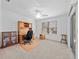 Bright office space featuring a built-in desk, ceiling fan, and natural light at 951 Chapman Loop, The Villages, FL 32162