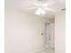 Bright bedroom featuring a modern ceiling fan and neutral walls, creating a serene and inviting space at 987 Princeton Dr, Clermont, FL 34711