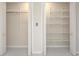These storage closets have multiple levels of shelving and storage for clothing at 987 Princeton Dr, Clermont, FL 34711