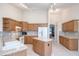 Bright kitchen boasts tile floors, an island, and ample cabinet space at 987 Princeton Dr, Clermont, FL 34711