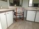 Functional bathroom vanity area with double sinks, ample counter space and vinyl floors at 1014 Dustin Dr, Lady Lake, FL 32159