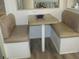 Cozy dining nook with booth seating and a laminate table, perfect for casual meals at 1014 Dustin Dr, Lady Lake, FL 32159