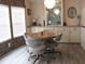 Inviting dining room with modern chandelier, hardwood flooring and ample natural light at 1014 Dustin Dr, Lady Lake, FL 32159