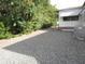 Side yard with dense trees at 1014 Dustin Dr, Lady Lake, FL 32159
