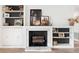 Elegant fireplace featuring a white mantle, built-in shelves, and modern decor at 1016 Cottonwood St, Leesburg, FL 34748