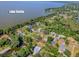 Aerial view of lot close to Lake Eustis with mature trees at 111 Cardinal Ln, Eustis, FL 32726