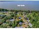 Aerial view of the lot near Lake Eustis and other houses at 111 Cardinal Ln, Eustis, FL 32726