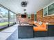 The screened in porch is the perfect place to sit, relax and enjoy the weather at 111 Cardinal Ln, Eustis, FL 32726