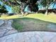 Backyard featuring lush lawn, mature trees, and a fence at 11301 Via Mari Cae Ct, Clermont, FL 34711