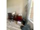 A functional office space with a desk, computer, and plenty of natural light at 11301 Via Mari Cae Ct, Clermont, FL 34711
