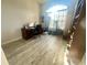 Bright office space with lots of natural light, hard surface flooring and desk area at 11301 Via Mari Cae Ct, Clermont, FL 34711