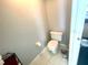 Toilet room features a toilet and a waste basket at 11301 Via Mari Cae Ct, Clermont, FL 34711
