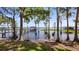 Scenic view of private lake with dock at 12104 Elbert St, Clermont, FL 34711
