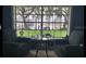 Inviting interior view showcasing waterfront scenery, seating area, and natural light at 12104 Elbert St, Clermont, FL 34711