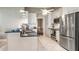 Modern kitchen boasting stainless steel appliances and sleek countertops at 12104 Elbert St, Clermont, FL 34711