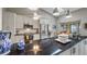 Contemporary kitchen design with stainless steel appliances and adjacent dining area at 12104 Elbert St, Clermont, FL 34711