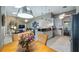 Open concept kitchen and living room area with ample natural light and modern design at 12104 Elbert St, Clermont, FL 34711