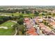 Community aerial view of lush golf course, and beautiful homes at 1305 Santa Maria Ave, The Villages, FL 32159