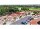 Aerial shot of a home on the golf course with lush landscaping and beautiful scenery at 1305 Santa Maria Ave, The Villages, FL 32159