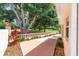 Back patio with golf course views, lush landscaping, and a serene and private outdoor living space at 1305 Santa Maria Ave, The Villages, FL 32159