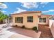 Rear exterior view shows a lanai, well-kept landscaping, and a red tile roof at 1305 Santa Maria Ave, The Villages, FL 32159