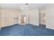 Expansive main bedroom with plush carpets, ceiling fan, and ensuite bathroom at 1305 Santa Maria Ave, The Villages, FL 32159