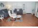 Inviting living room with a comfortable seating area, stylish decor, and a spacious layout at 1310 Jimenez Ct, The Villages, FL 32159