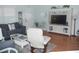 Cozy living room with modern furniture, stylish decor, and a bright, airy atmosphere at 1310 Jimenez Ct, The Villages, FL 32159