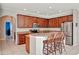 Well-equipped kitchen with a breakfast bar, stainless steel appliances, and plenty of cabinet space at 15322 Veramonte Way, Orlando, FL 32828