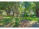 Backyard with established trees providing shade and privacy at 1663 Markel Dr. Dr, Winter Garden, FL 34787