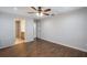 Spacious bedroom with luxury vinyl plank flooring and ensuite bathroom and laundry room at 1663 Markel Dr. Dr, Winter Garden, FL 34787