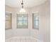 This charming breakfast nook offers sun-filled windows at 1663 Markel Dr. Dr, Winter Garden, FL 34787