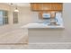 Bright kitchen boasts ample counter space, modern appliances, and natural wood cabinets at 1663 Markel Dr. Dr, Winter Garden, FL 34787