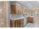 An open kitchen features wood cabinetry, recessed lighting, and an inviting breakfast nook at 1663 Markel Dr. Dr, Winter Garden, FL 34787