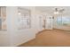 Bright living room with neutral carpet, ceiling fan and a door to the outside at 1663 Markel Dr. Dr, Winter Garden, FL 34787
