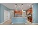 Modern kitchen showcasing granite countertops, stainless steel appliances and pendant lighting at 169 Jensen Dr, Groveland, FL 34736
