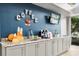 Contemporary coffee bar area with granite countertops and modern fixtures at 2112 Saint Ives Ct, Clermont, FL 34711