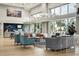 Inviting lobby with stylish seating, a coffee bar, and ample natural light at 2112 Saint Ives Ct, Clermont, FL 34711