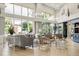Bright lobby area with high ceilings, large windows, and comfortable seating arrangements at 2112 Saint Ives Ct, Clermont, FL 34711