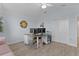 Bright home office with vaulted ceilings, dual monitors, and closet for storage creates a productive workspace at 2129 Landrea Loop, The Villages, FL 32163