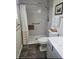 Contemporary bathroom with walk-in shower, neutral color palette, brushed nickel hardware and good natural light at 2167 Kerwood Loop, The Villages, FL 32162