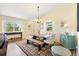 Comfortable dining area featuring stylish furnishings and natural light, perfect for entertaining at 2167 Kerwood Loop, The Villages, FL 32162