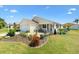 Charming single-story home with well-manicured lawn and landscaping, offering great curb appeal at 2167 Kerwood Loop, The Villages, FL 32162