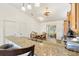 Open kitchen with granite countertops, stainless steel appliances, and a breakfast bar, great for entertaining at 2167 Kerwood Loop, The Villages, FL 32162